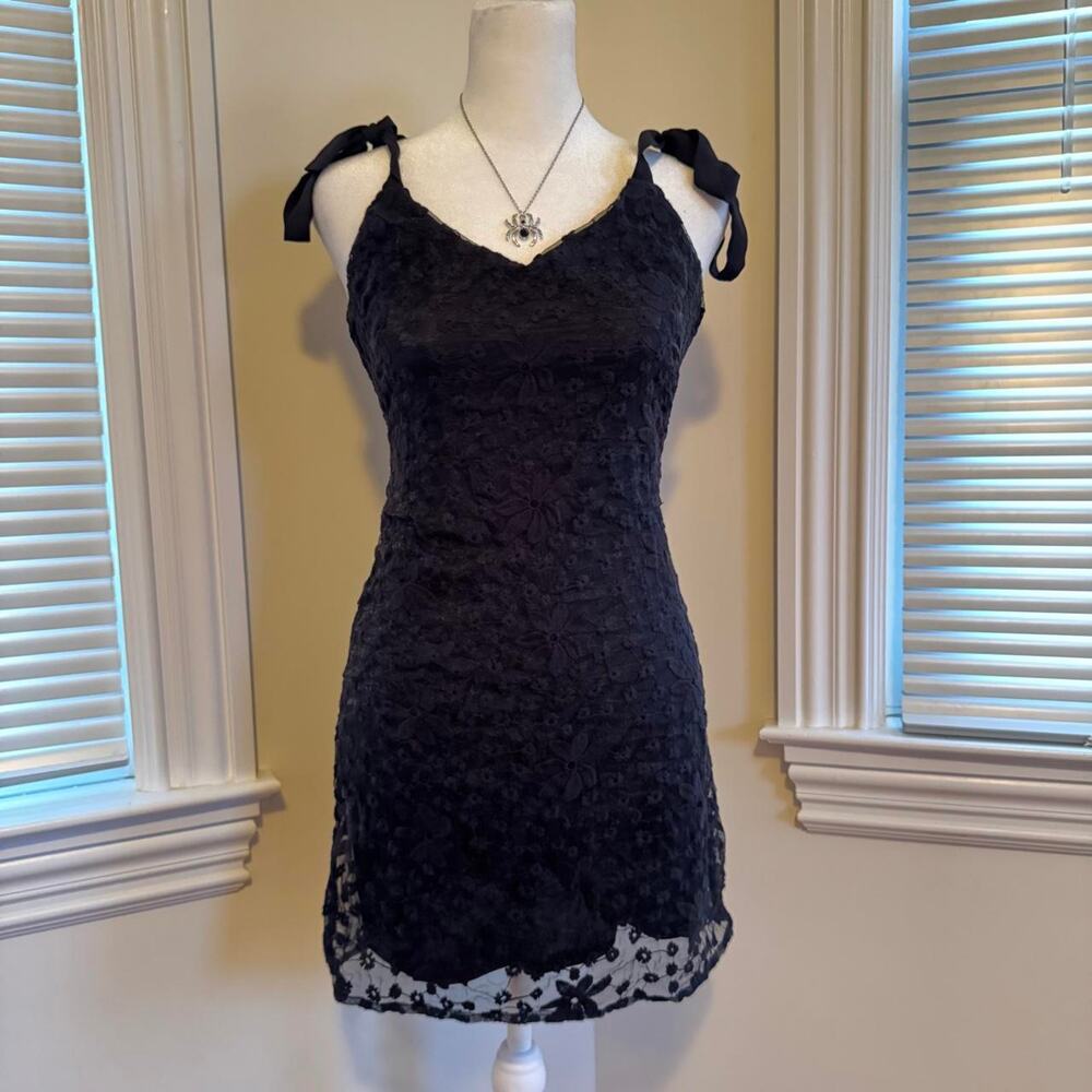 Francescas black mini dress with floral pattern